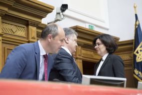 Andriy Parubii, Petro Poroshenko and Oksana Syroyid