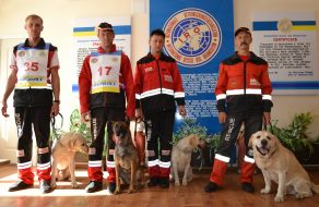 Dog handlers with dogs