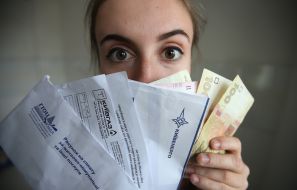The girl keeps the money and receipts for housing and communal services
