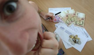 Girl counting money for housing services