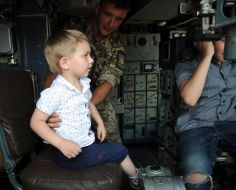 A soldier and children