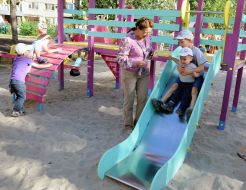 Children play on the playground in the park