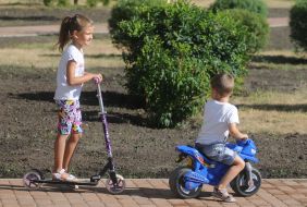 Children play on the playground in the park
