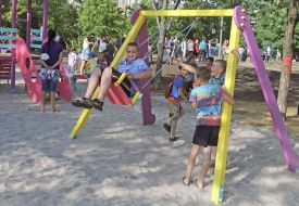 Children play on the playground in the park