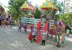 Children play on the playground in the park