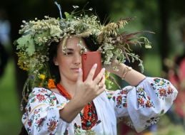 Girl in a wreath of wildflowers
