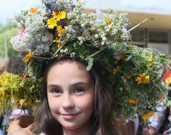 Girl in a wreath of wildflowers