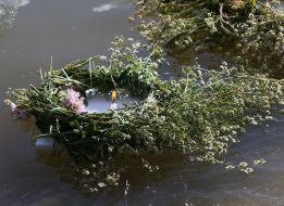 A wreath of wild flowers on the water