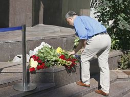 The man brought flowers to the French Embassy