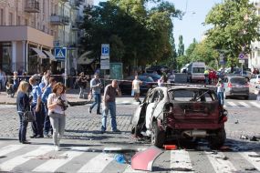Police officers on site car explosion
