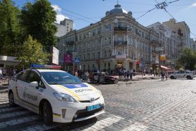 Police officers on site car explosion