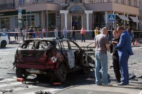 Police officers on site car explosion