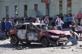 Police officers on site car explosion