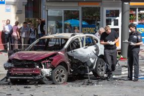 Police officers on site car explosion