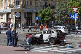 Police officers on site car explosion