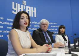 Eugene Belaya, Greg Lightfoot and Elena Kozachek