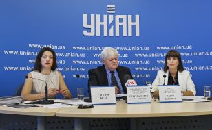 Eugene Belaya, Greg Lightfoot and Elena Kozachek