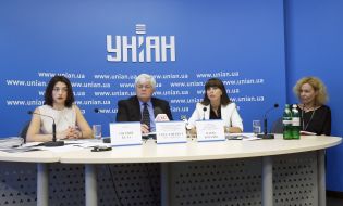 Eugene Belaya, Greg Lightfoot and Elena Kozachek