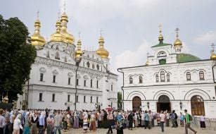 Members of the UOC MP procession queue up in the refectory
