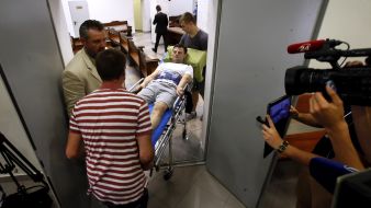 Valery Postny on hospital gurney