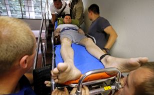 Valery Postny on hospital gurney