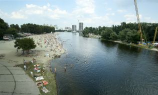 People relax on the beach
