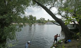 People relax on the beach