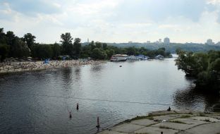 People relax on the beach