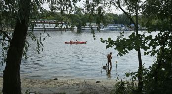 People relax on the beach