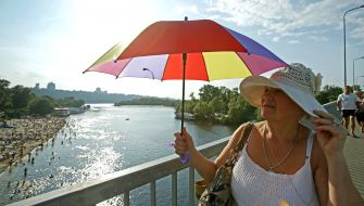 People relax on the beach