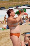 Woman drinking beer
