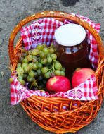 Basket with fruit and honey