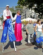 Performers on stilts