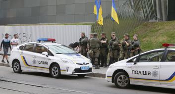 Law enforcers near the TV channel "Inter"