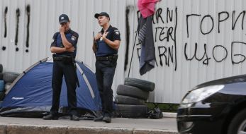 Law enforcers near the TV channel "Inter"