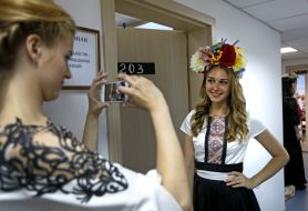 A model demonstrates a dress