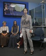 A model demonstrates a dress