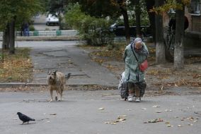 Elderly woman with a dog