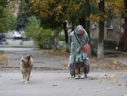 Elderly woman with a dog