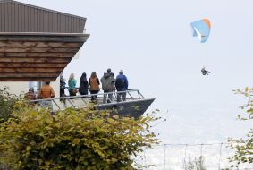 Paragliders fly over the mountain Salève