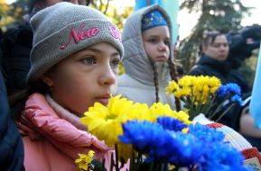 Children laying flowers