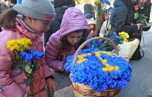 Children laying flowers