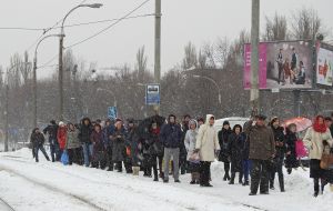 People on the tram stop