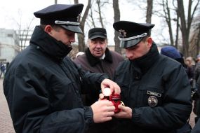 Police officers are lit oil lamps