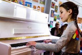 The girl playing the piano