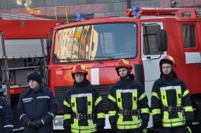 Firefighters at the fire trucks