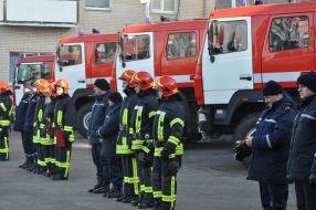 Firefighters at the fire trucks