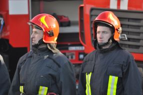 Firefighters at the fire trucks