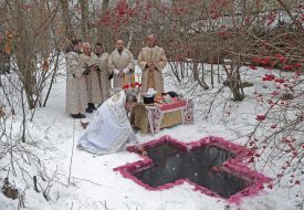 A priest holds consecrated