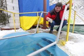 A man washes money in water